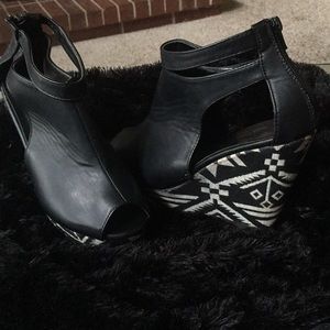 Black leather wedges